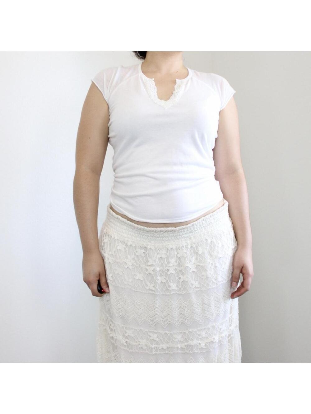 Vintage Jordache white lace top with sequin detail. Size M